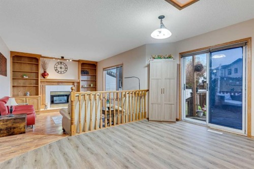 399 Sunlake Road Se, Calgary, AB - Indoor With Fireplace