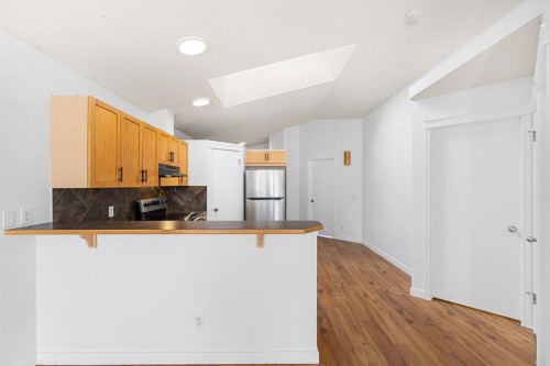 203 Prestwick Heights Se, Calgary, AB - Indoor Photo Showing Kitchen