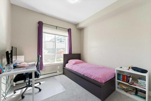 104-110 Auburn Meadows View Se, Calgary, AB - Indoor Photo Showing Bedroom