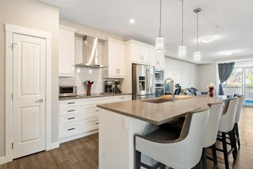 104-110 Auburn Meadows View Se, Calgary, AB - Indoor Photo Showing Kitchen With Stainless Steel Kitchen With Upgraded Kitchen