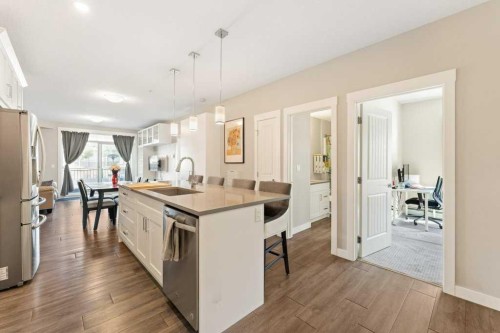 104-110 Auburn Meadows View Se, Calgary, AB - Indoor Photo Showing Kitchen With Upgraded Kitchen