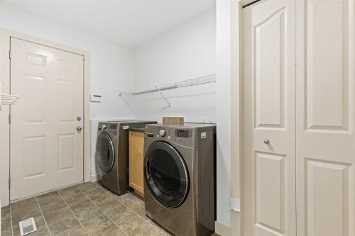 7936 Springbank Boulevard Sw, Calgary, AB - Indoor Photo Showing Laundry Room