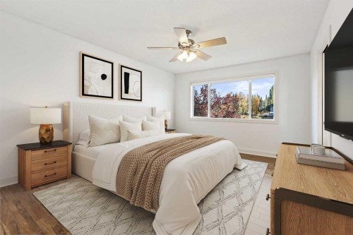 7936 Springbank Boulevard Sw, Calgary, AB - Indoor Photo Showing Bedroom