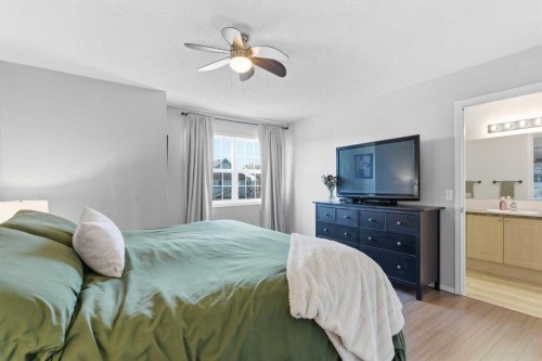 74 Evansbrooke Way Nw, Calgary, AB - Indoor Photo Showing Bedroom