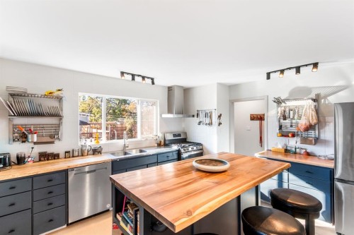 5301 44 Street, Olds, AB - Indoor Photo Showing Kitchen With Double Sink