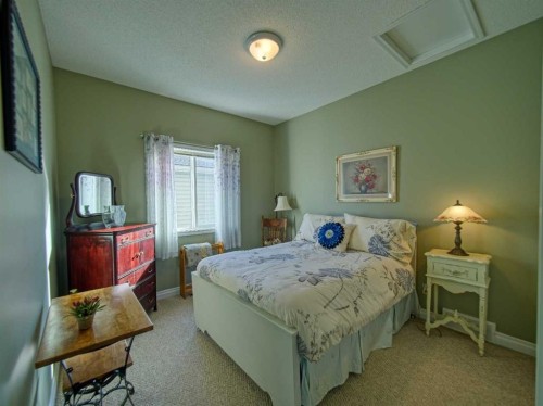 239 Sagewood Drive, Airdrie, AB - Indoor Photo Showing Bedroom