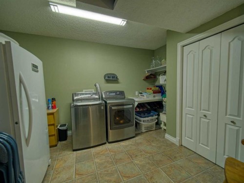 239 Sagewood Drive, Airdrie, AB - Indoor Photo Showing Laundry Room