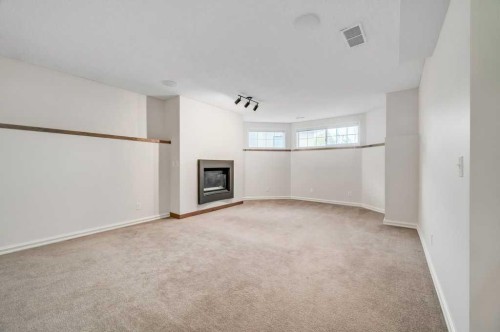 222 Diamond Court Se, Calgary, AB - Indoor With Fireplace