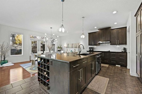 129 Springbluff Boulevard Sw, Calgary, AB - Indoor Photo Showing Kitchen With Upgraded Kitchen