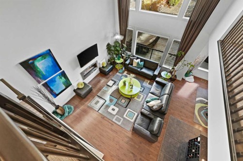 129 Springbluff Boulevard Sw, Calgary, AB - Indoor With Fireplace