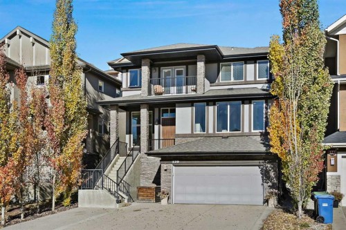 129 Springbluff Boulevard Sw, Calgary, AB - Outdoor With Facade