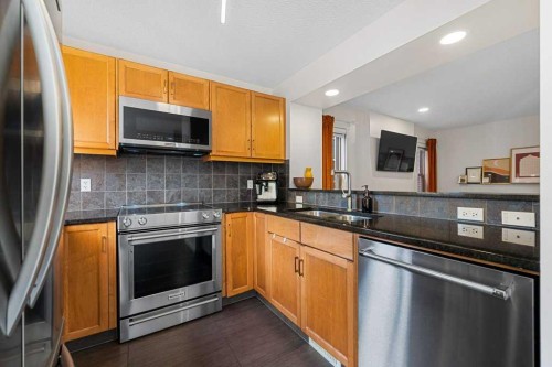 184 Sage Valley Drive Nw, Calgary, AB - Indoor Photo Showing Kitchen With Double Sink