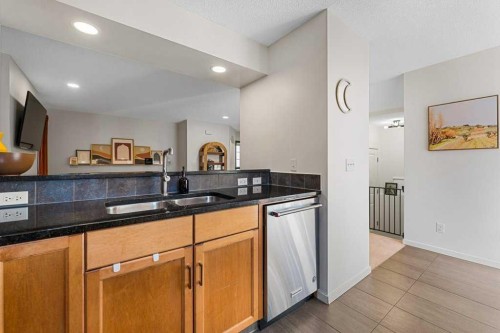 184 Sage Valley Drive Nw, Calgary, AB - Indoor Photo Showing Kitchen With Double Sink