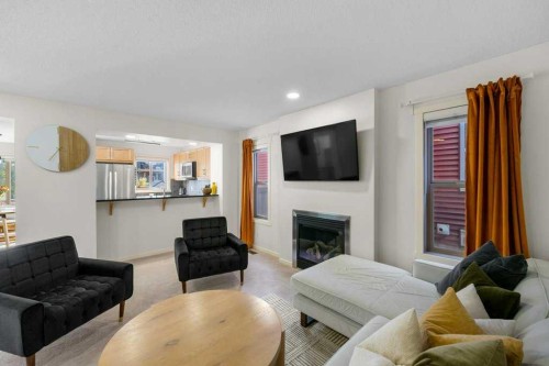 184 Sage Valley Drive Nw, Calgary, AB - Indoor Photo Showing Living Room With Fireplace