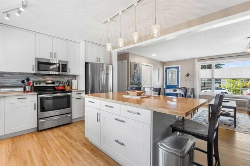 8516 Addison Drive Se, Calgary, AB - Indoor Photo Showing Kitchen With Stainless Steel Kitchen With Upgraded Kitchen