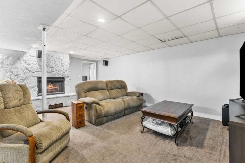 8516 Addison Drive Se, Calgary, AB - Indoor With Fireplace