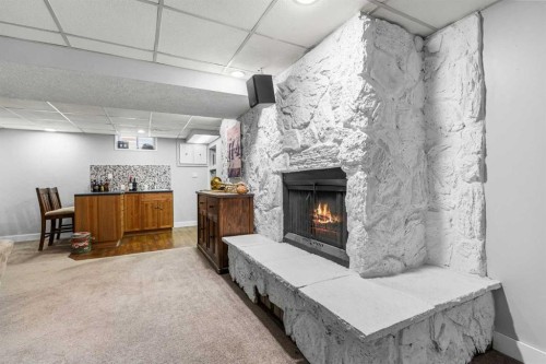8516 Addison Drive Se, Calgary, AB - Indoor With Fireplace
