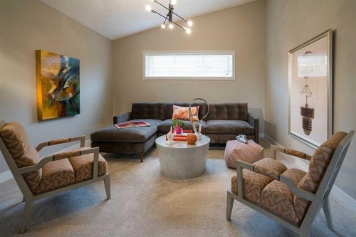 72 Sunrise Heath, Cochrane, AB - Indoor Photo Showing Living Room