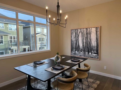 72 Sunrise Heath, Cochrane, AB - Indoor Photo Showing Dining Room