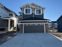 72 Sunrise Heath, Cochrane, AB  - Outdoor With Facade 