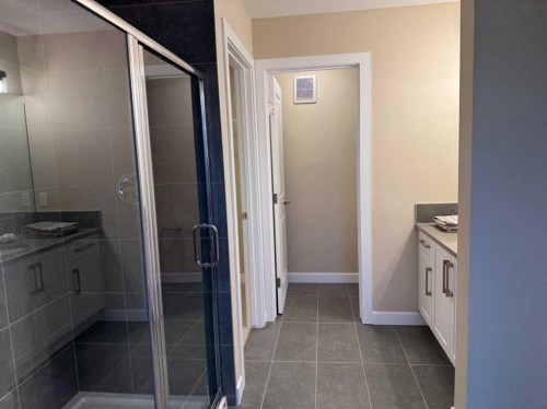 72 Sunrise Heath, Cochrane, AB - Indoor Photo Showing Bathroom