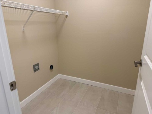 72 Sunrise Heath, Cochrane, AB - Indoor With Storage