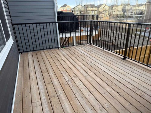 72 Sunrise Heath, Cochrane, AB - Outdoor With Deck Patio Veranda With Exterior
