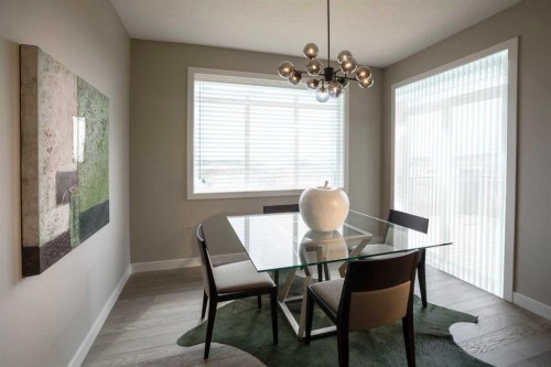 72 Sunrise Heath, Cochrane, AB - Indoor Photo Showing Dining Room