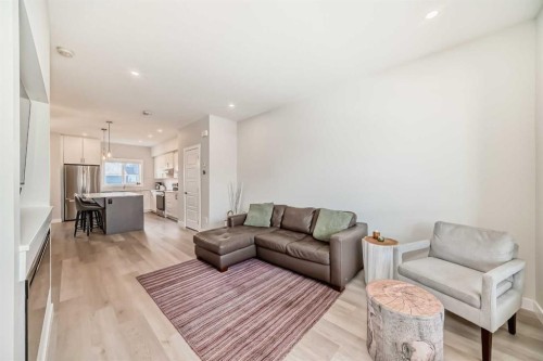 934 Cobblemore Common Sw, Airdrie, AB - Indoor Photo Showing Living Room
