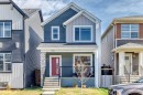 934 Cobblemore Common Sw, Airdrie, AB  - Outdoor With Facade 