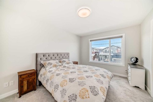 934 Cobblemore Common Sw, Airdrie, AB - Indoor Photo Showing Bedroom