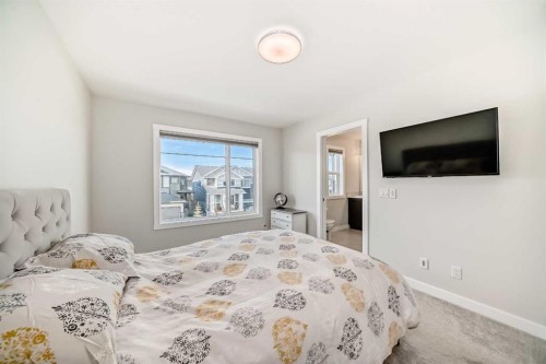 934 Cobblemore Common Sw, Airdrie, AB - Indoor Photo Showing Bedroom
