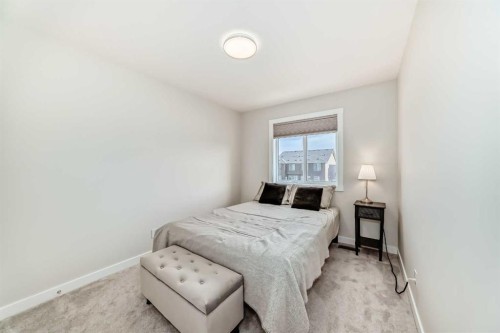 934 Cobblemore Common Sw, Airdrie, AB - Indoor Photo Showing Bedroom