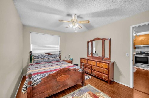 65 Tararidge Circle Ne, Calgary, AB - Indoor Photo Showing Bedroom