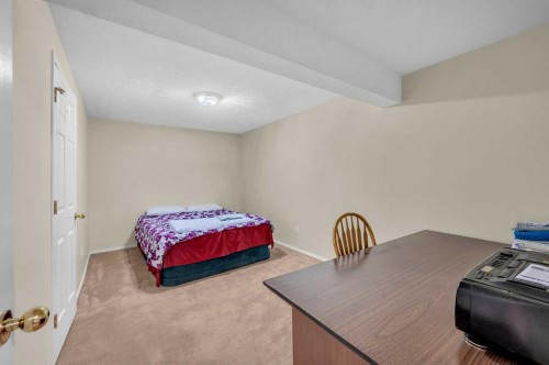 65 Tararidge Circle Ne, Calgary, AB - Indoor Photo Showing Bedroom