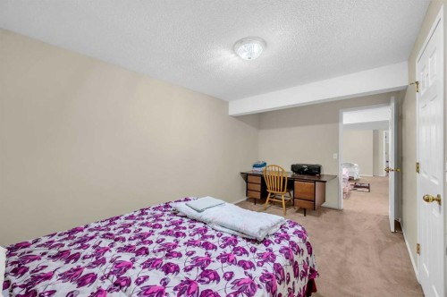 65 Tararidge Circle Ne, Calgary, AB - Indoor Photo Showing Bedroom