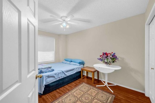 65 Tararidge Circle Ne, Calgary, AB - Indoor Photo Showing Bedroom