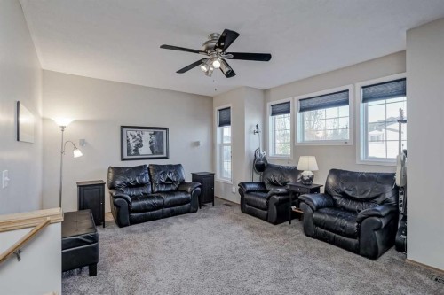 8 Everstone Rise Sw, Calgary, AB - Indoor Photo Showing Living Room