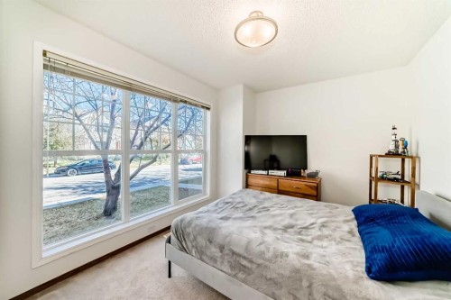 201 Cranberry Square Se, Calgary, AB - Indoor Photo Showing Bedroom