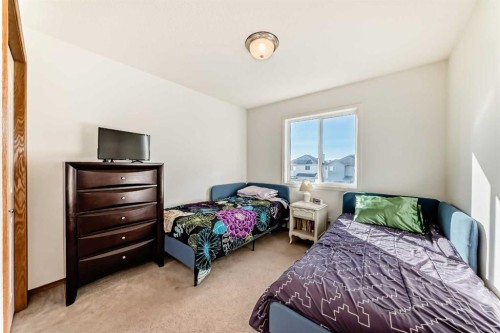 201 Cranberry Square Se, Calgary, AB - Indoor Photo Showing Bedroom