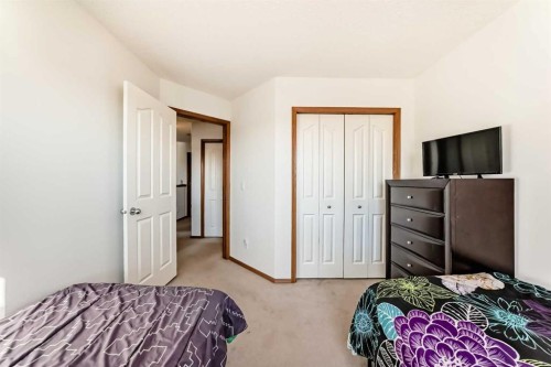 201 Cranberry Square Se, Calgary, AB - Indoor Photo Showing Bedroom
