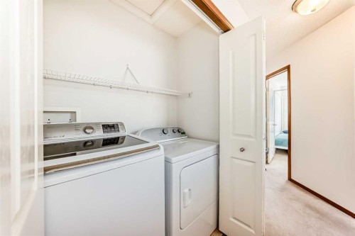 201 Cranberry Square Se, Calgary, AB - Indoor Photo Showing Laundry Room