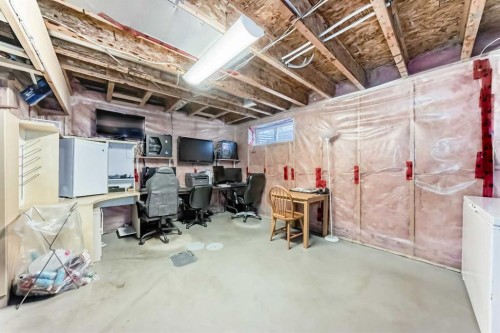 201 Cranberry Square Se, Calgary, AB - Indoor Photo Showing Basement