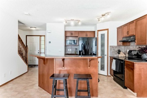 201 Cranberry Square Se, Calgary, AB - Indoor Photo Showing Kitchen