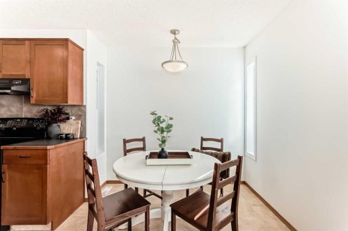 201 Cranberry Square Se, Calgary, AB - Indoor Photo Showing Dining Room