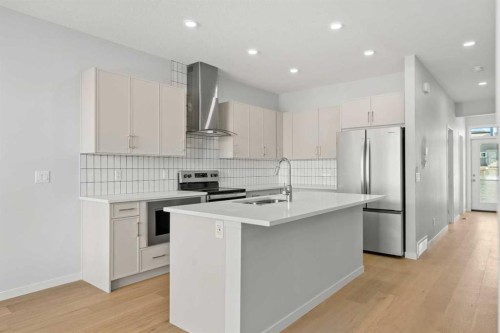 80 Carringvue Place Nw, Calgary, AB - Indoor Photo Showing Kitchen With Upgraded Kitchen