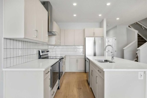 80 Carringvue Place Nw, Calgary, AB - Indoor Photo Showing Kitchen With Double Sink With Upgraded Kitchen