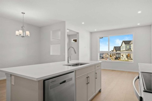 80 Carringvue Place Nw, Calgary, AB - Indoor Photo Showing Kitchen With Double Sink