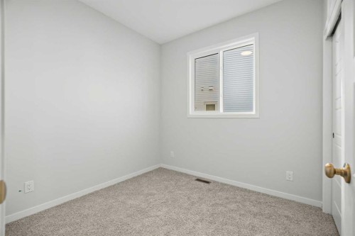 80 Carringvue Place Nw, Calgary, AB - Indoor Photo Showing Other Room