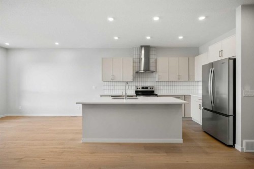80 Carringvue Place Nw, Calgary, AB - Indoor Photo Showing Kitchen With Double Sink With Upgraded Kitchen